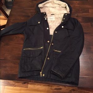 Black “ Tread Supply” winter coat